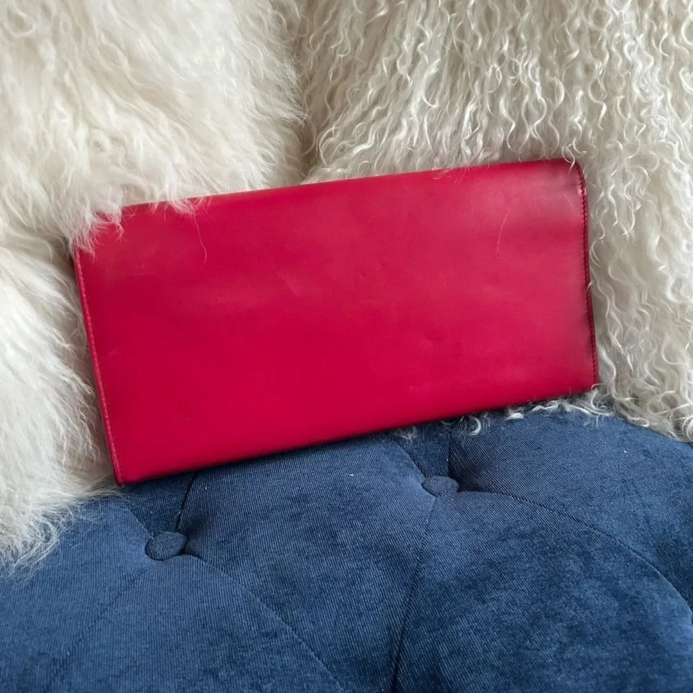 Yves Saint Laurent Fuchsia Clutch with Gold Logo